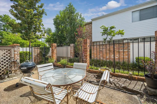swimming pool with outdoor seating