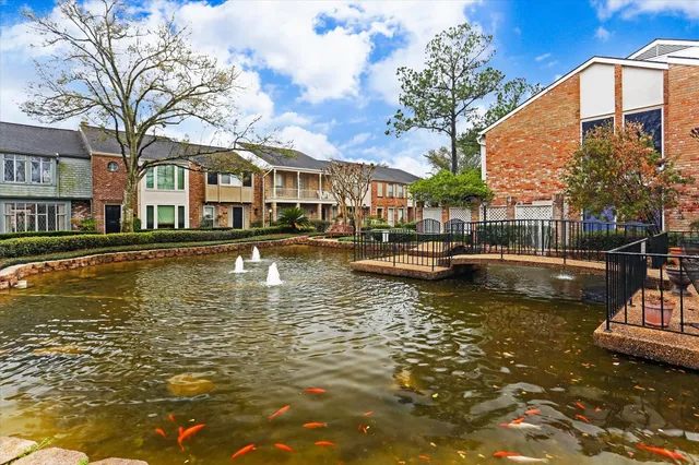 a view of an ocean with residential houses