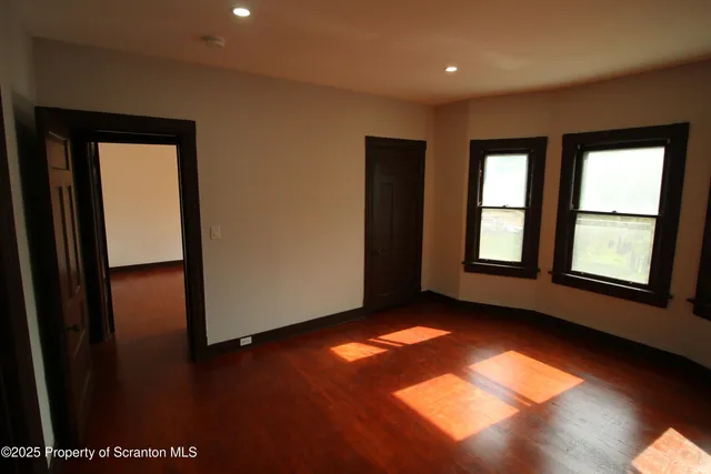 a view of an empty room with window