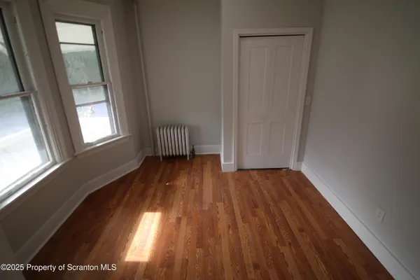 a view of livingroom with hardwood and window