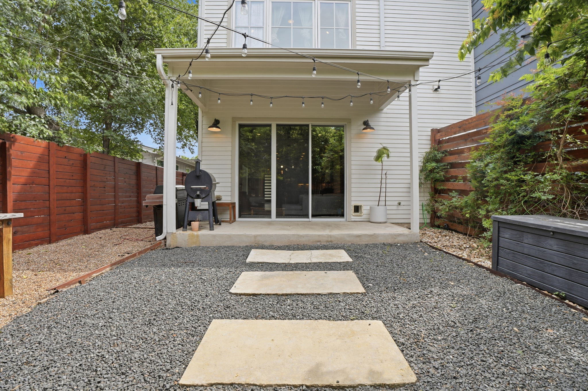 4609 Sara Drive, Unit B Austin, TX 78721 - Photo 32 of 39 A private low-maintenance backyard oasis with a covered patio, perfect for outdoor entertaining.