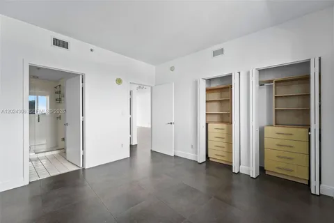 wooden floor and closet in a room