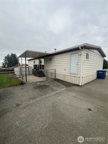 a view of a house with a garage