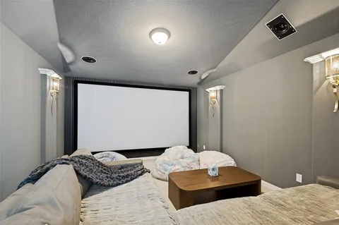 a bedroom with bed and walk in closet