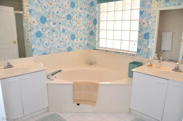 a bathroom with a sink and a bathtub