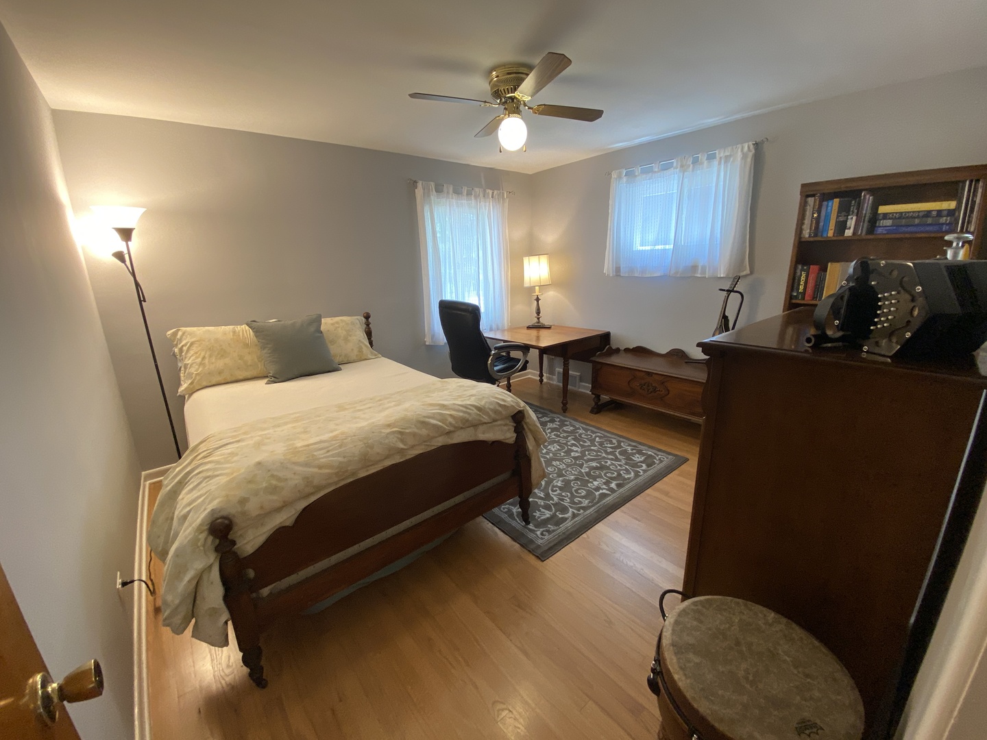 3810 Wolf Road Western Springs, IL 60558 - Photo 12 of 35 a bedroom with a bed lamps and dresser