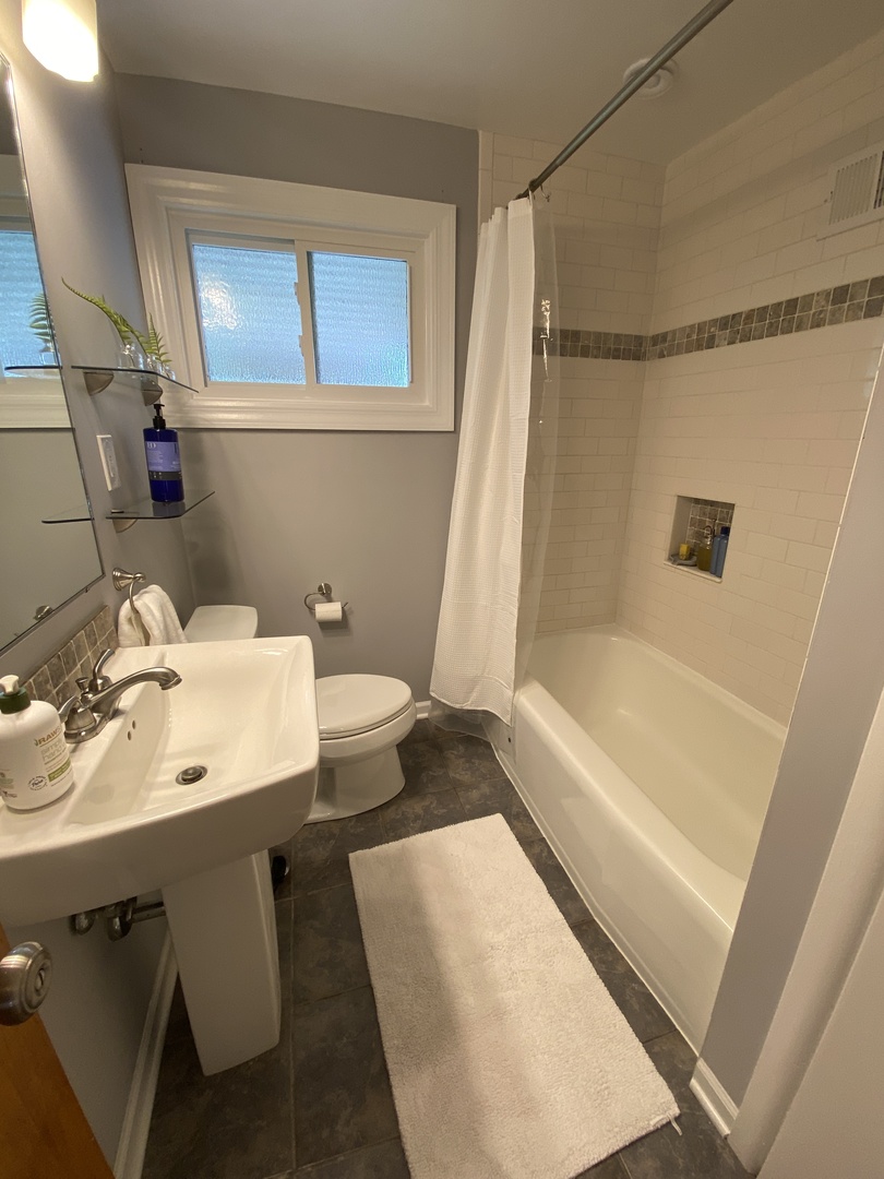 3810 Wolf Road Western Springs, IL 60558 - Photo 15 of 35 a bathroom with a sink and a mirror