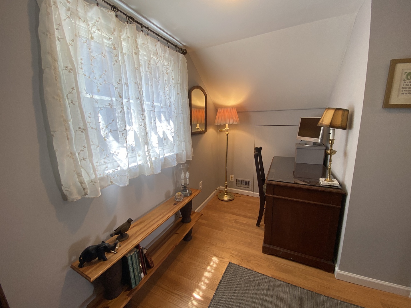 3810 Wolf Road Western Springs, IL 60558 - Photo 19 of 35 a room with gym equipment and a window