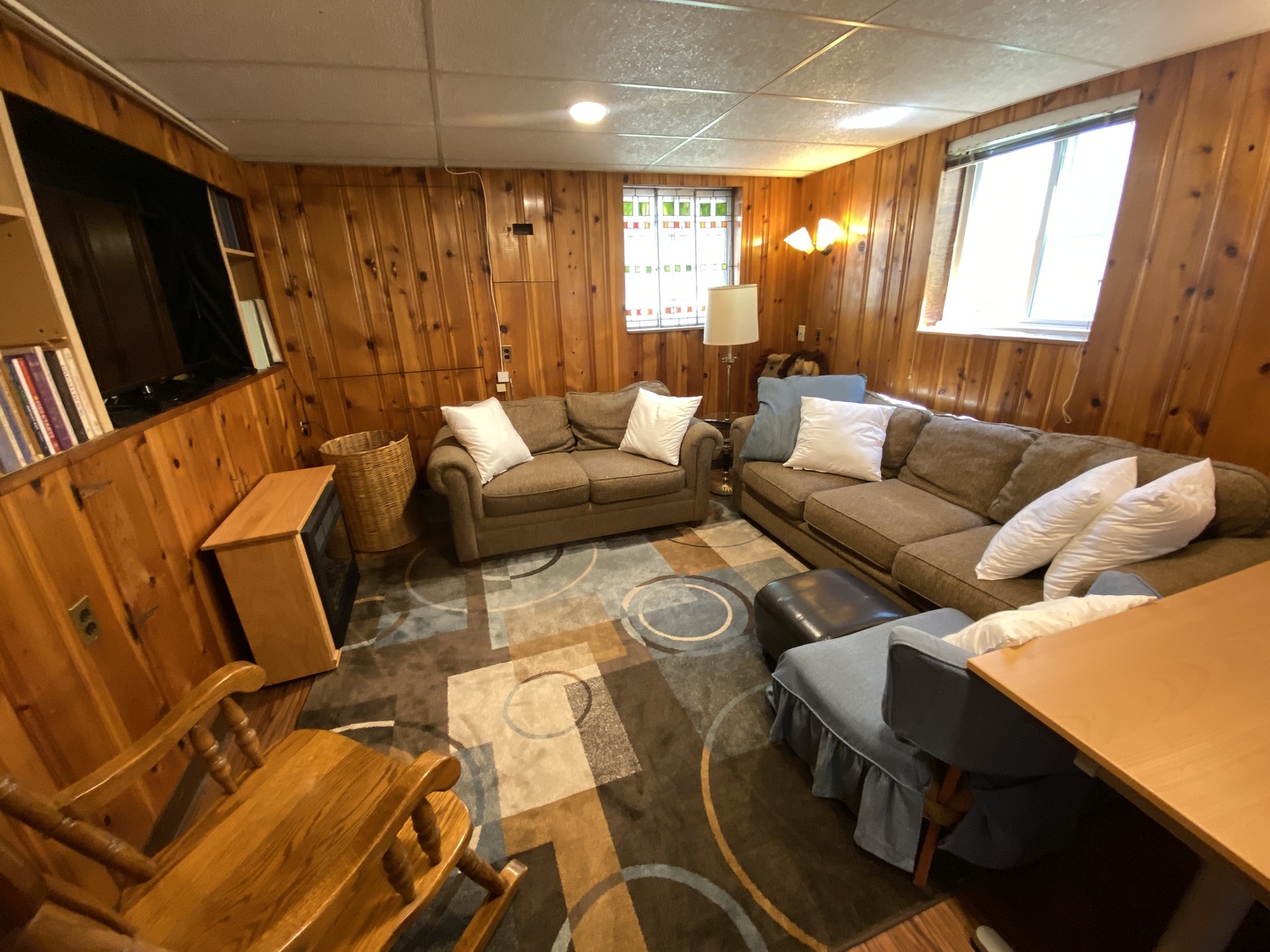 3810 Wolf Road Western Springs, IL 60558 - Photo 24 of 35 a living room with furniture and a flat screen tv