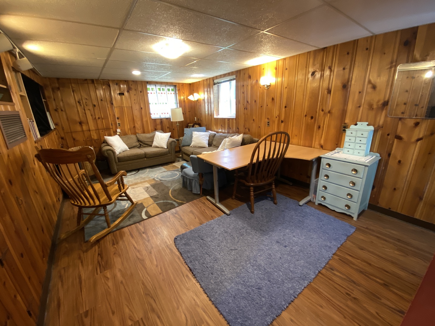 3810 Wolf Road Western Springs, IL 60558 - Photo 25 of 35 a living room with lots of furniture and a rug