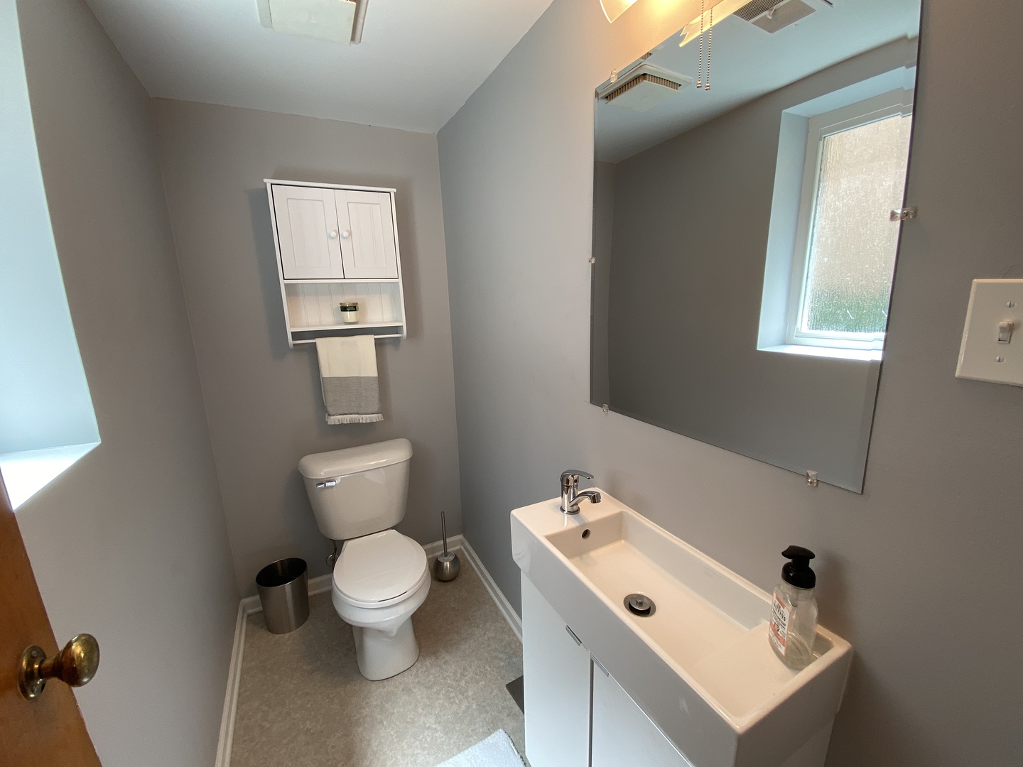 3810 Wolf Road Western Springs, IL 60558 - Photo 27 of 35 a bathroom with a toilet sink and mirror