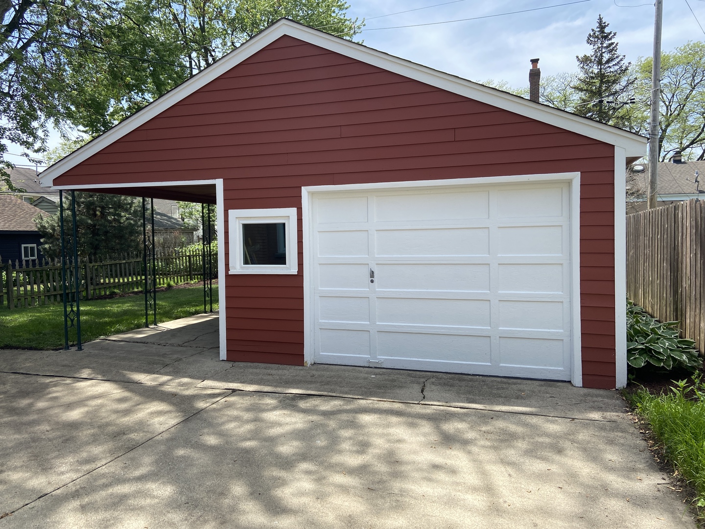 3810 Wolf Road Western Springs, IL 60558 - Photo 29 of 35 a front view of a house with a yard and garage