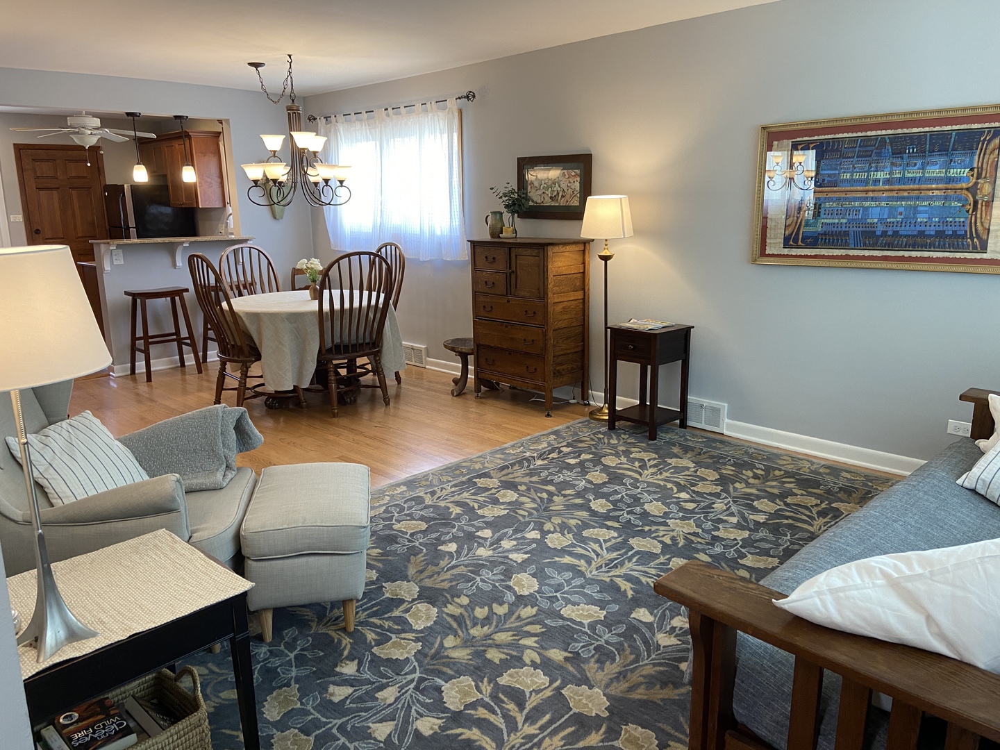 3810 Wolf Road Western Springs, IL 60558 - Photo 4 of 35 a living room with furniture and a lamp