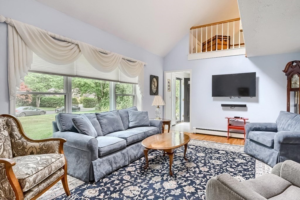 71 Peach Tree Road Barnstable, MA 02648 - Photo 8 of 39 a living room with furniture and a flat screen tv