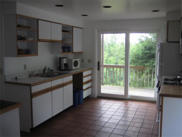 1452 Hawley Road Ashfield, MA 01330 - Photo 18 of 24 a kitchen with stainless steel appliances a sink stove and cabinets