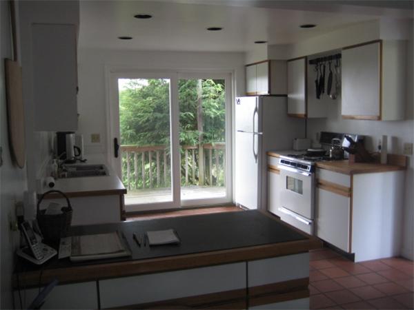 1452 Hawley Road Ashfield, MA 01330 - Photo 19 of 24 a kitchen with a stove a sink and a cabinets