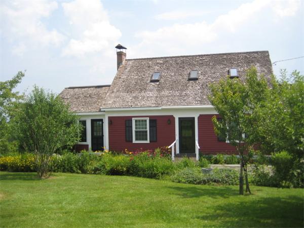 1452 Hawley Road Ashfield, MA 01330 - Photo 3 of 24 a view of a house with yard and a garden