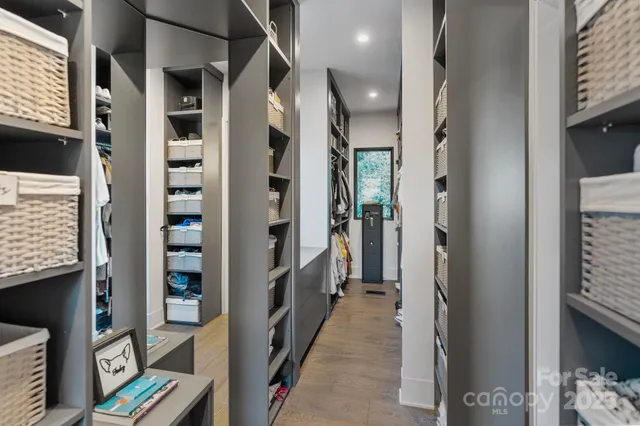 a bathroom with a sink double vanity and a mirror