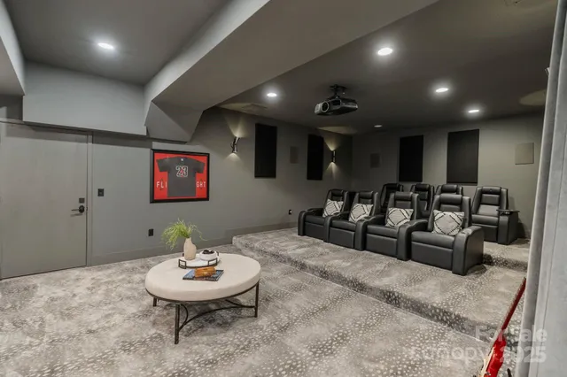 a lobby with furniture and a potted plant