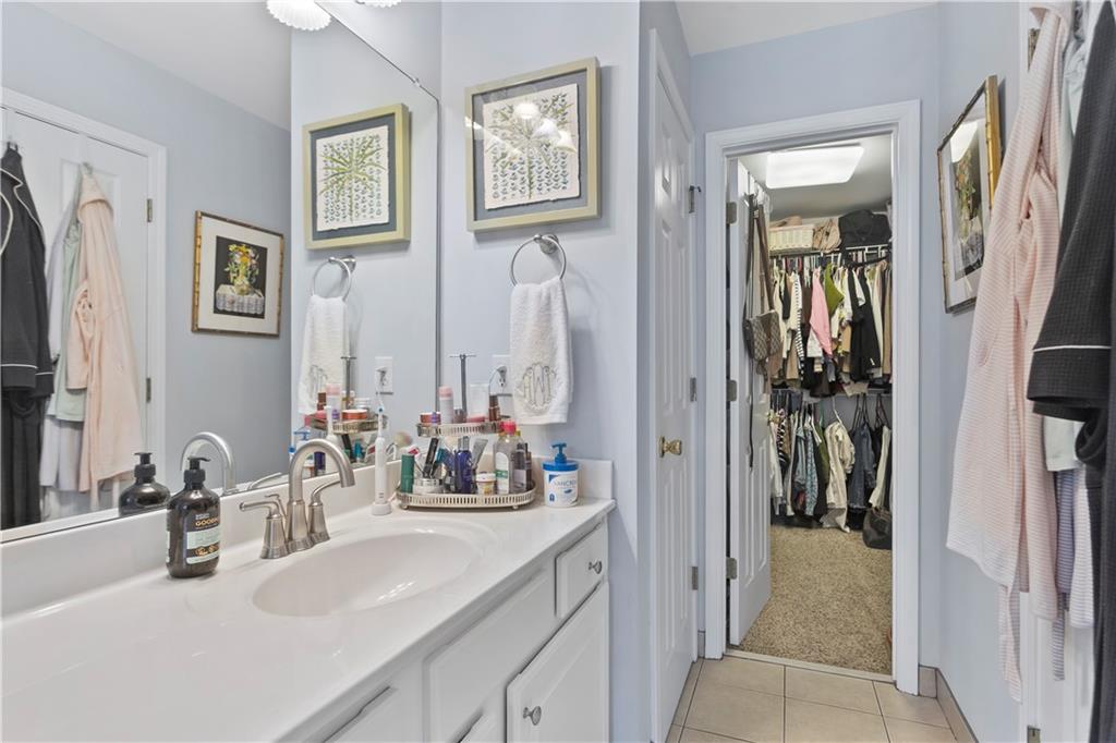 2924 Wintercrest Way Atlanta, GA 30360 - Photo 15 of 36 a bathroom with a sink and a mirror