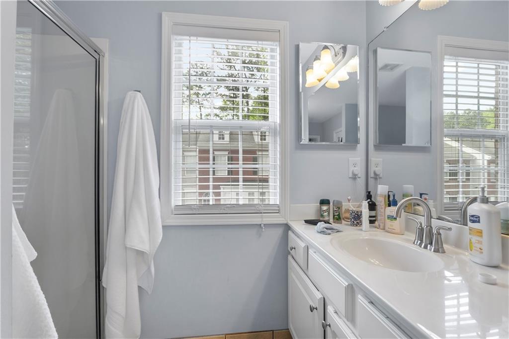 2924 Wintercrest Way Atlanta, GA 30360 - Photo 16 of 36 a kitchen with a sink cabinets and a window