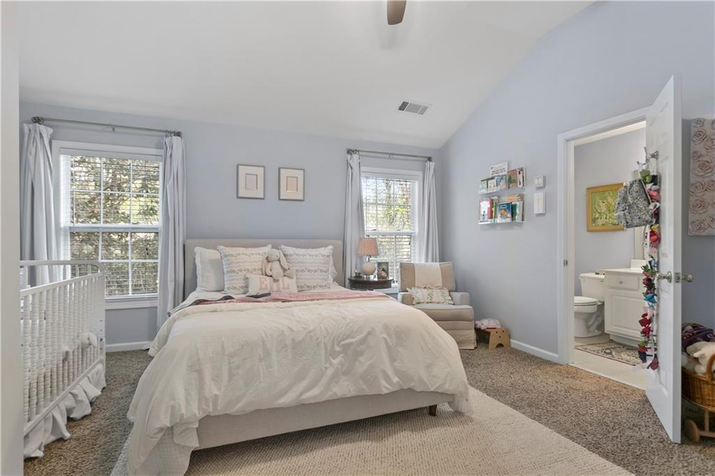 2924 Wintercrest Way Atlanta, GA 30360 - Photo 20 of 36 a bedroom with a bed and a window