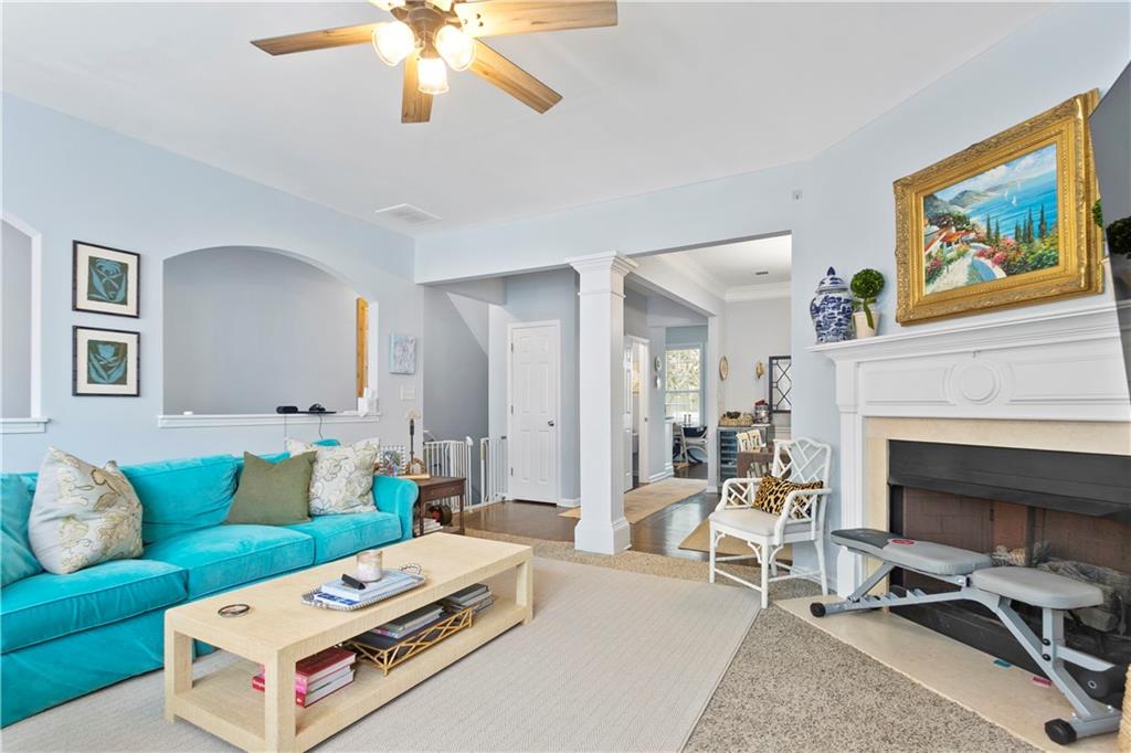 2924 Wintercrest Way Atlanta, GA 30360 - Photo 3 of 36 a living room with furniture and a fireplace