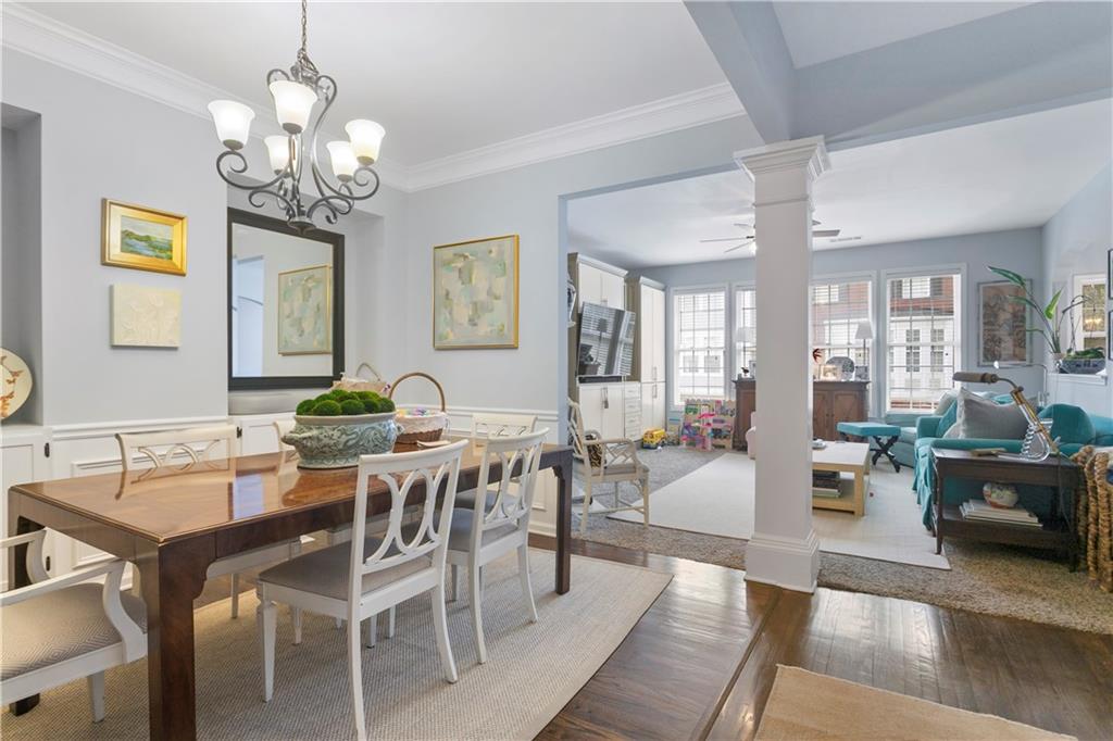 2924 Wintercrest Way Atlanta, GA 30360 - Photo 6 of 36 a view of a dining room with furniture a chandelier and wooden floor
