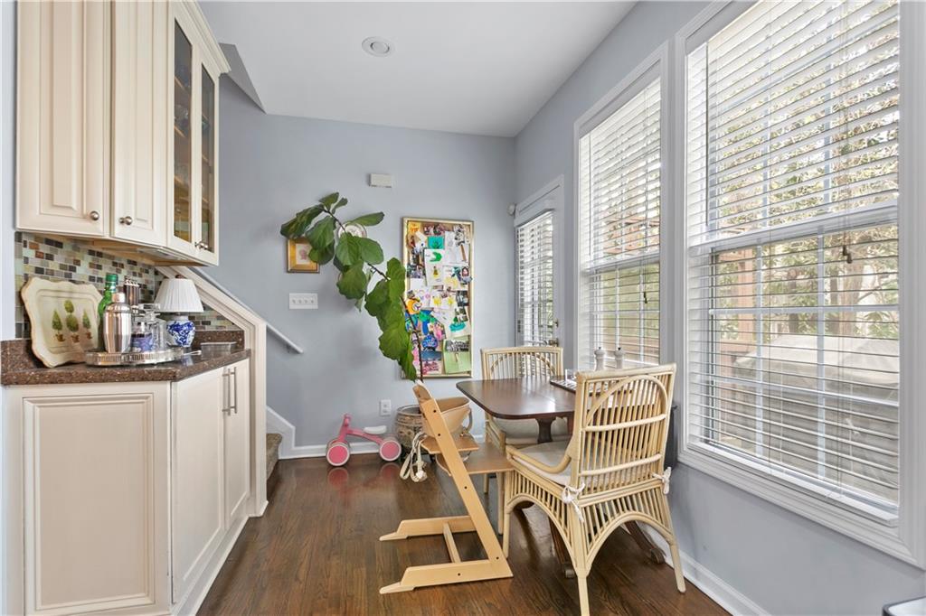 2924 Wintercrest Way Atlanta, GA 30360 - Photo 8 of 36 a dining room with furniture mountain view and a potted plant