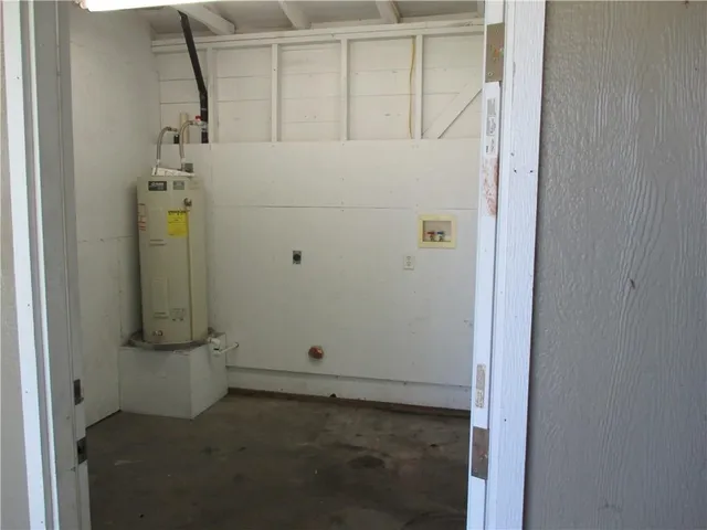 a view of a backyard of the house