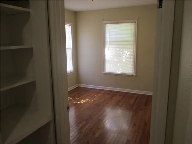 a view of an empty room and window