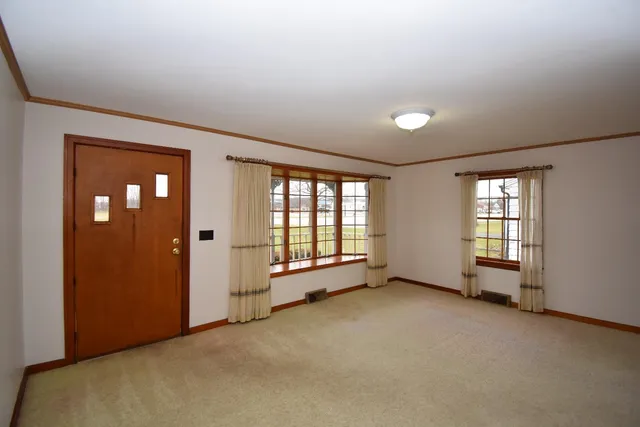 an empty room with windows