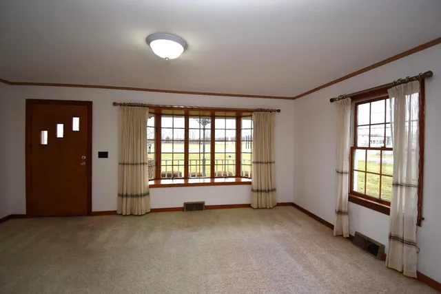 an empty room with windows