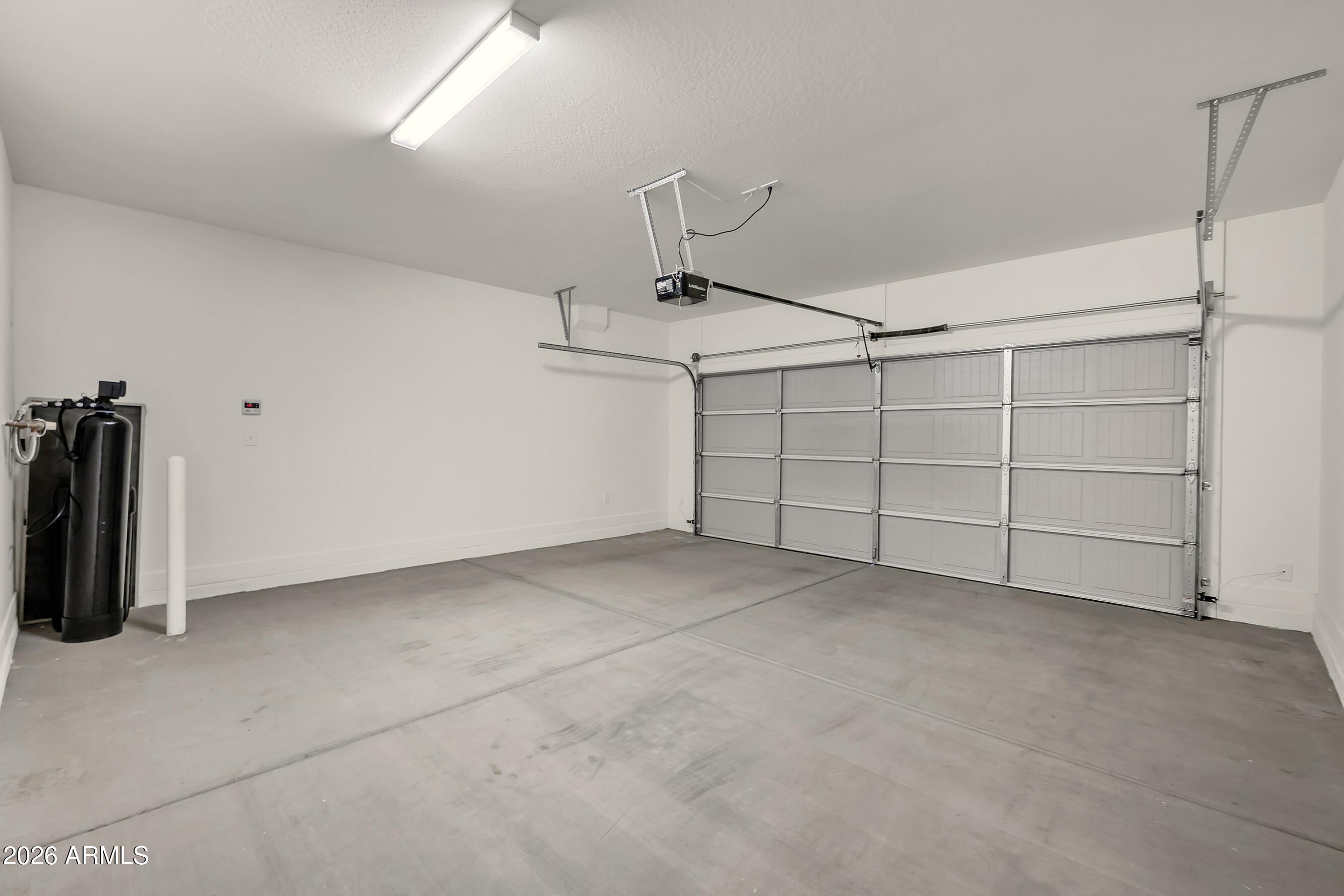 14843 West Sand Hills Road Surprise, AZ 85387 - Photo 33 of 40 11_garage