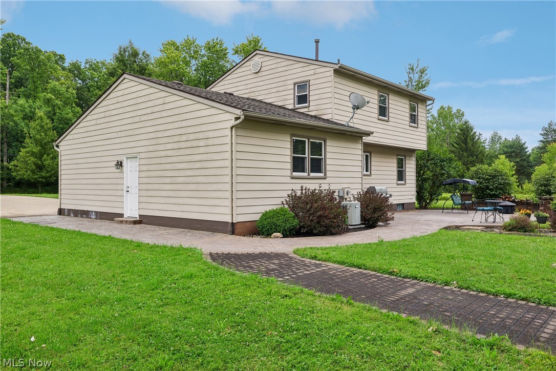 4702 Alger Road Richfield, OH 44286 - Photo 39 of 46 Back of home with patio and walkway
