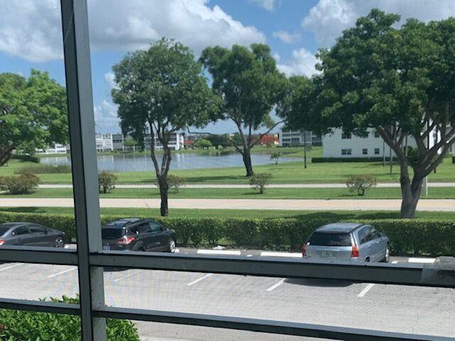 274 Dorset G Boca Raton, FL 33434 - Photo 10 of 23 Screened Patio with Lake View