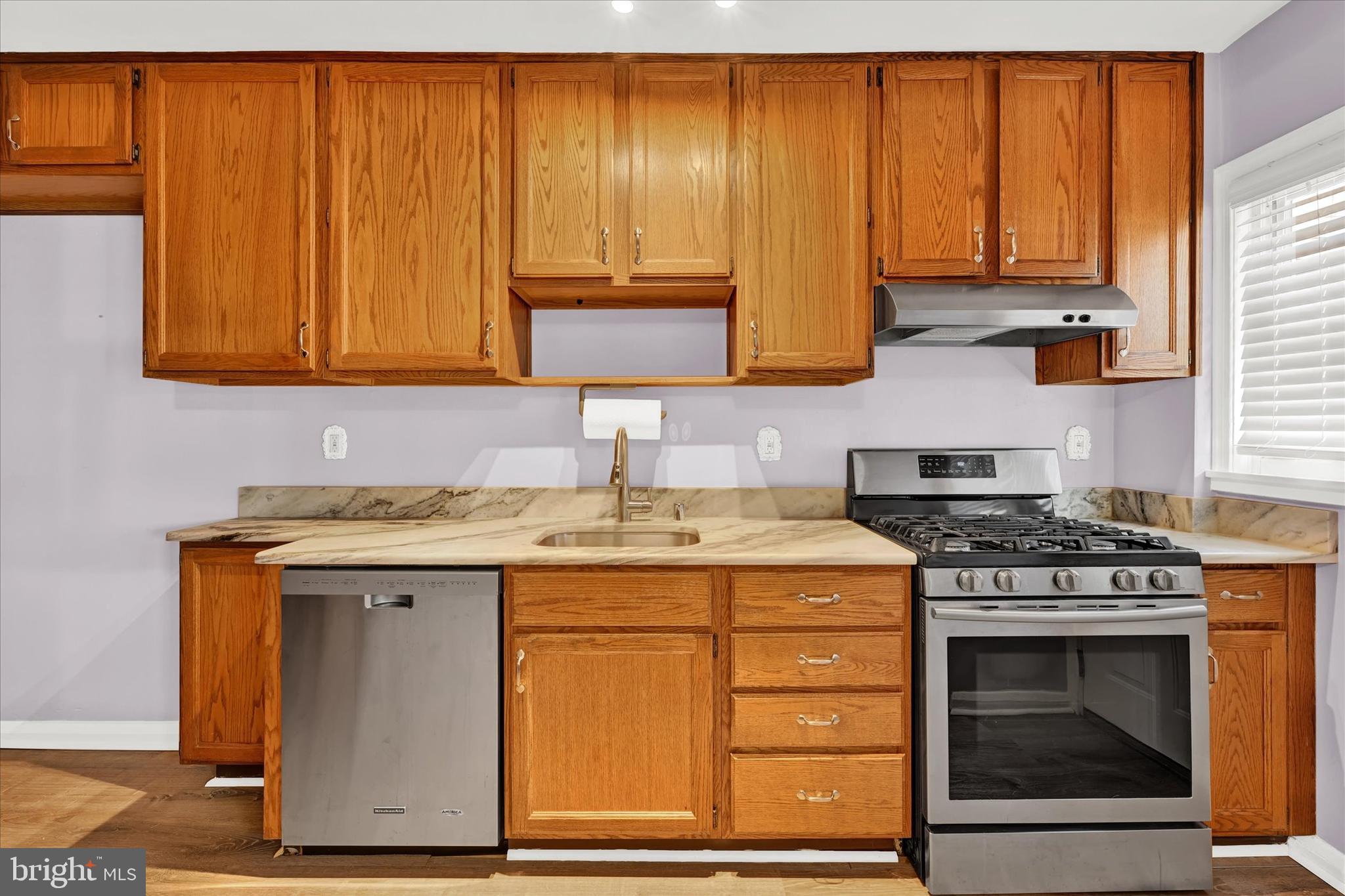 8356 Edgedale Road Parkville, MD 21234 - Photo 4 of 22 Tall cabinets and stainless steel appliances