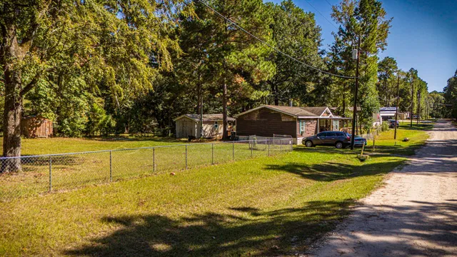 a view of a swimming pool with trees