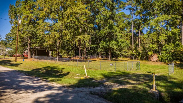 a view of a swimming pool with an outdoor space and seating area