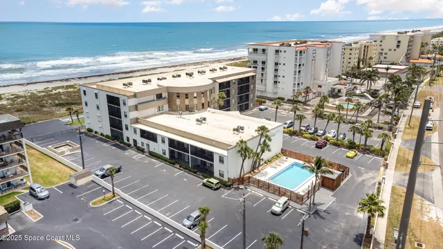 an aerial view of a building with outdoor space
