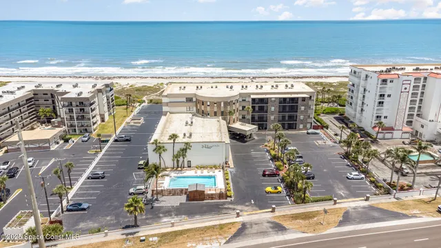 a view of swimming pool with outdoor seating