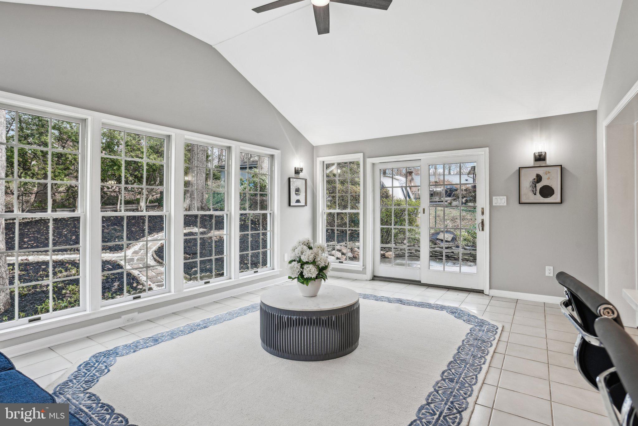 8826 Stark Road Annandale, VA 22003 - Photo 10 of 47 Sunroom with slider to outdoor patio area