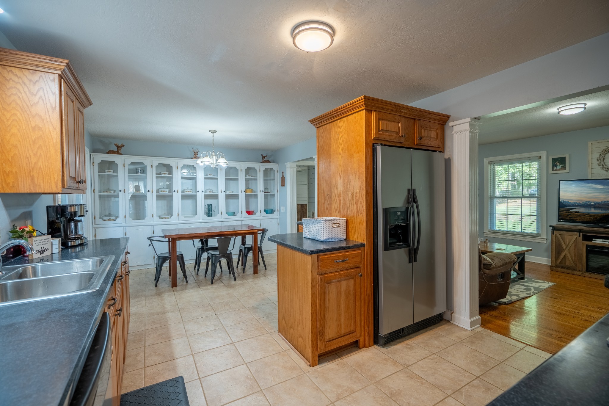 27 Tandy Road Leoma, TN 38468 - Photo 14 of 27 a kitchen with stainless steel appliances granite countertop a refrigerator and a sink
