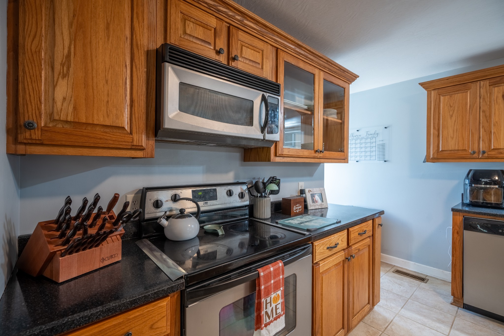 27 Tandy Road Leoma, TN 38468 - Photo 18 of 27 a kitchen with stainless steel appliances granite countertop a stove and cabinets