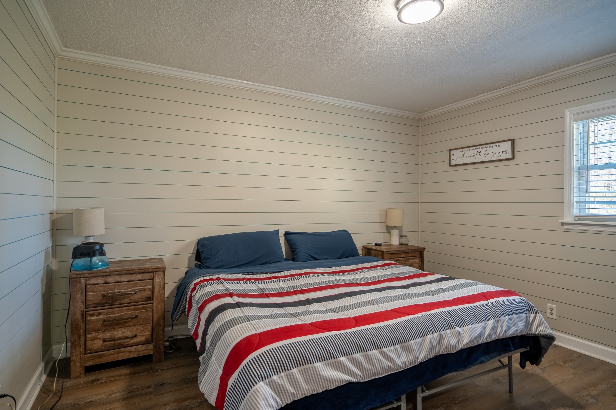 27 Tandy Road Leoma, TN 38468 - Photo 19 of 27 a bedroom with a bed and a lamp