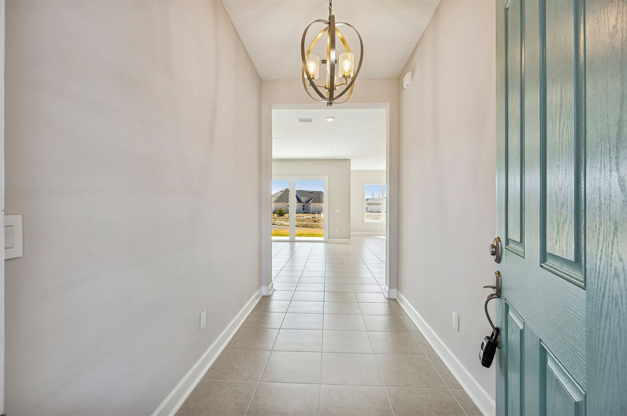 85417 Sandy Rdg Loop Yulee, FL 32097 - Photo 4 of 21 a view of a hallway with wooden floor