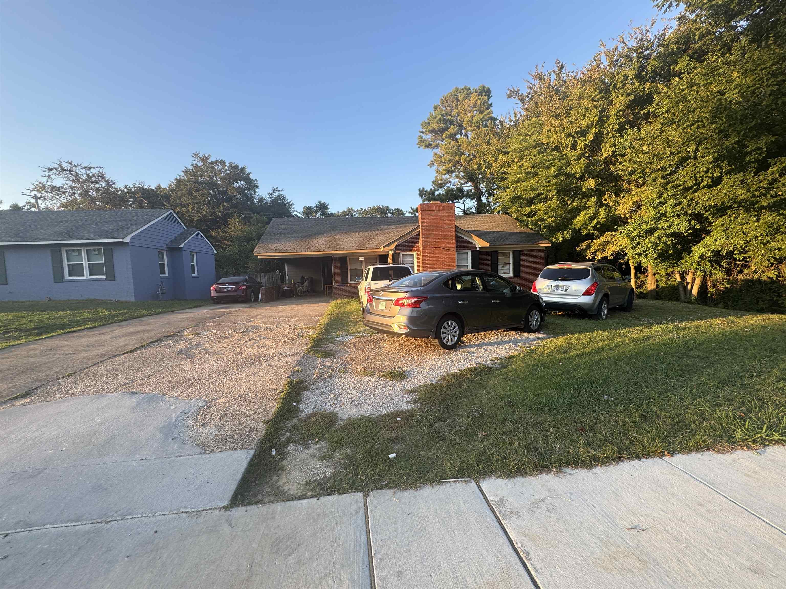 a car parked in front of a house