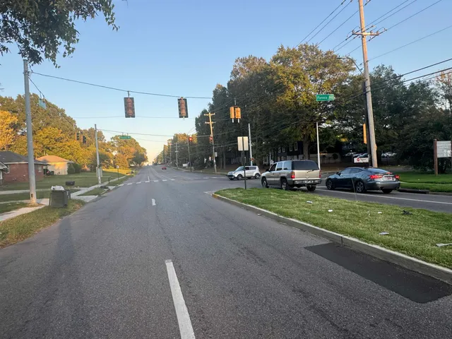 a view of a street with houses