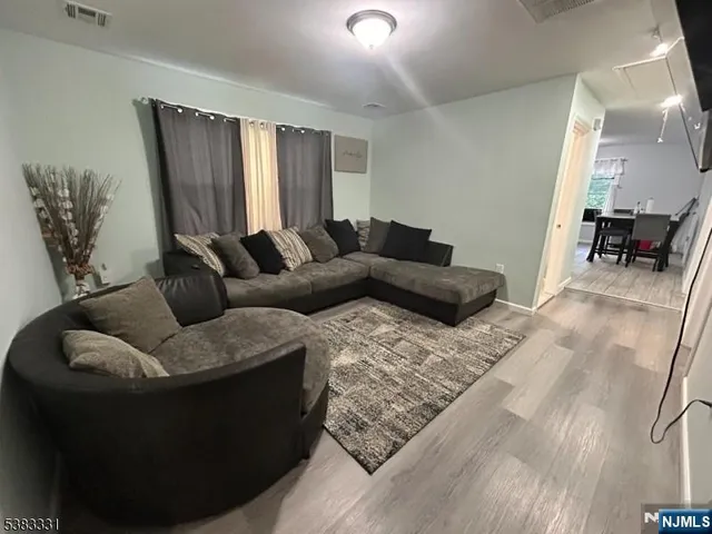 a living room with furniture and a couch