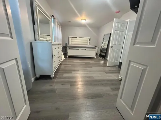 a view of a hallway with stairs